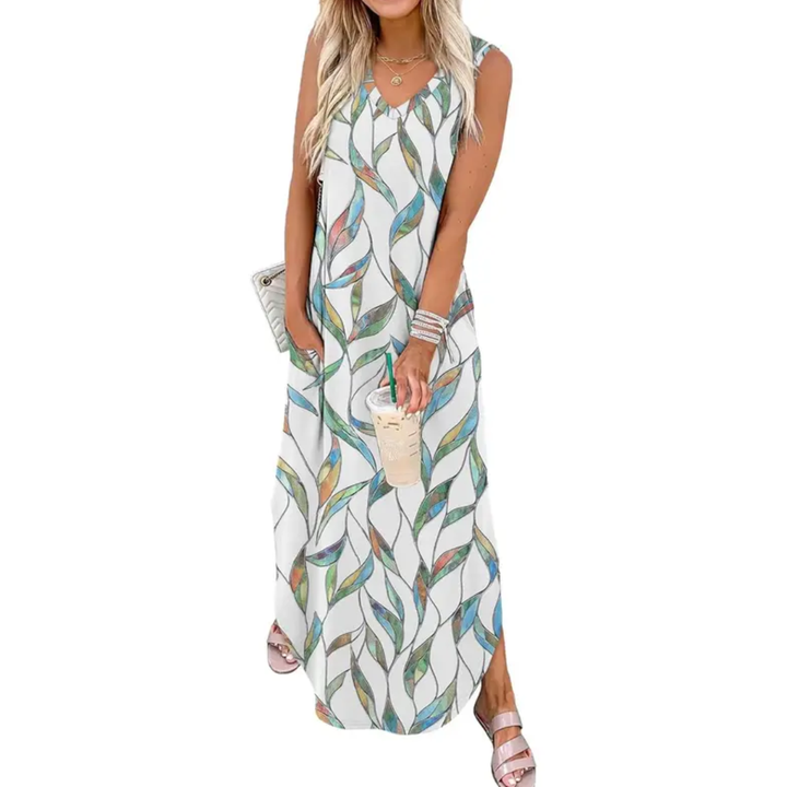 CASPIENNE™ – Robe longue fluide fleurie avec poches
