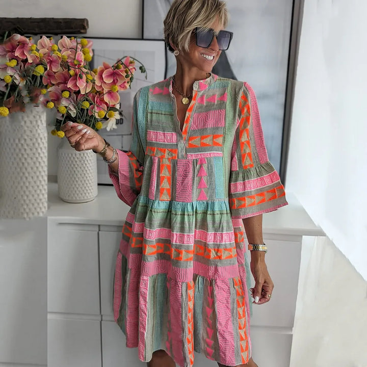 Kiki | Robe midi élégante de printemps (Presque épuisé)